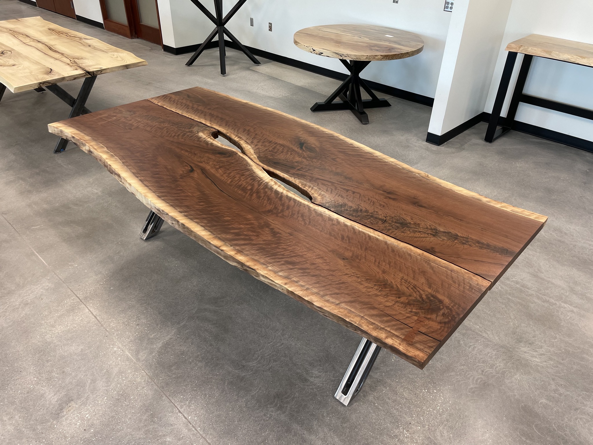 Live-edge wood furniture adds an organic touch to interior design. - design  KC