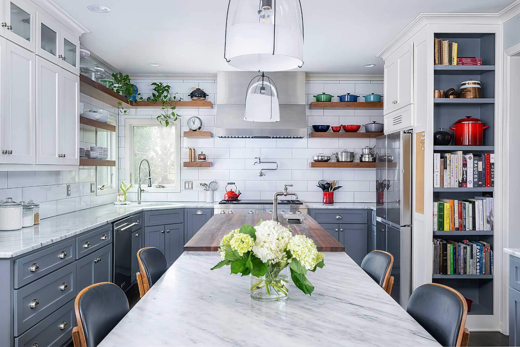 Two chefs = two work surfaces in Colby and Megan Garrelts’ kitchen. Butcher block for prep and pasta-making (but no cutting); cool marble for pastries and dining.
