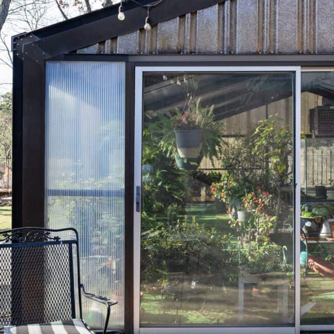 Not only does Mukharji grind her own flavorings, she grows some of them, too. She turned an enclosed pool into a greenhouse, where hundreds of plants flourish in the warmth. Top right: A Curry Leaf plant is an aromatic herb and a staple of Indian cuisine. Lower left: Winter oranges make especially nice marmalades. Bottom right: Potted plants overwinter in the greenhouse; in the summer, Mukharji brings them outside to bask on the patio by the house.
