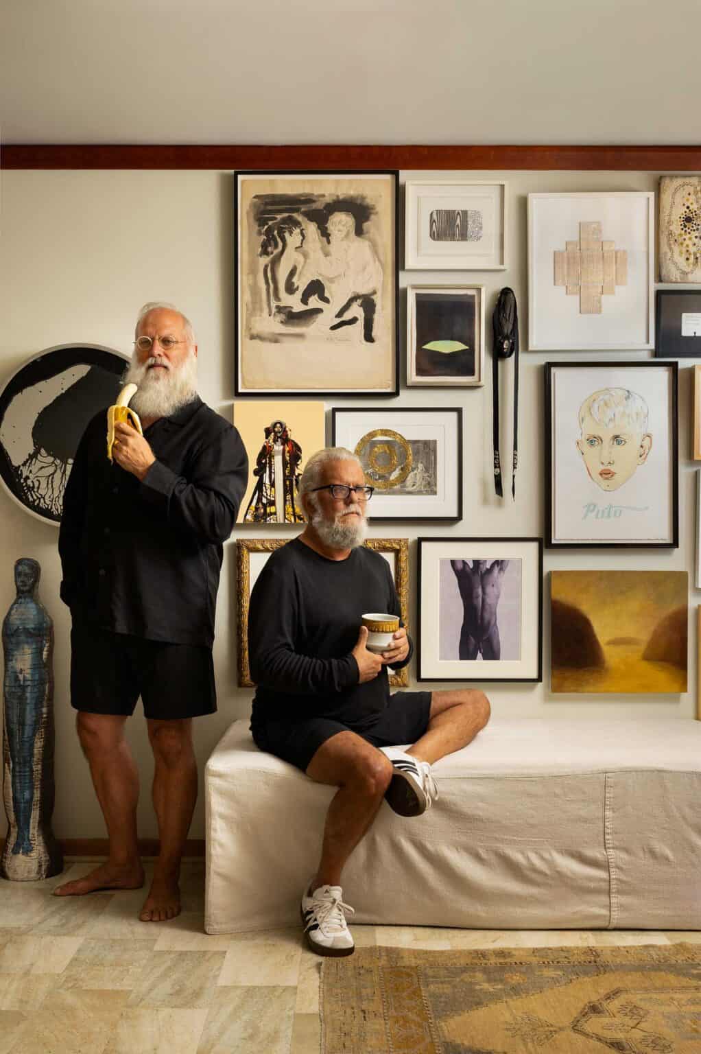 In the kitchen’s lounge, Heidmann stands next to a Laetitia Hohenberg stoneware sculpture. A gallery wall behind Petti includes a vintage watercolor from Christopher Filley, a Karl Lagerfeld nude he photographed for Visionaire’s The Emperor’s New Clothes. Others include works by Peregrine Honig, May Tveit, Marcus Cain, Gavin Benjamin, among others.