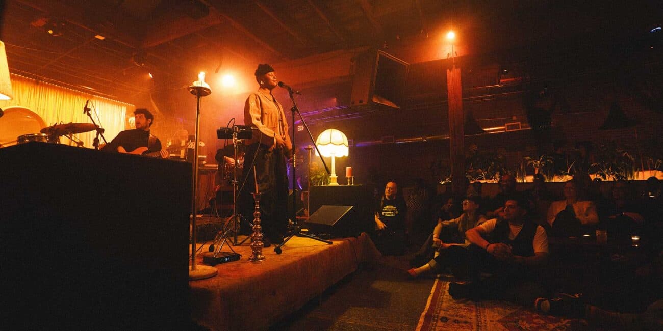 On the ITLF stage, Hailes met people’s eyes, introduced herself, and moved through the space as both headliner and someone sharing in the music. Designed to “erase that barrier and really make it a communal experience,” Living Room fostered a symbiotic exchange in which “the audience also has to make space for the performer.”